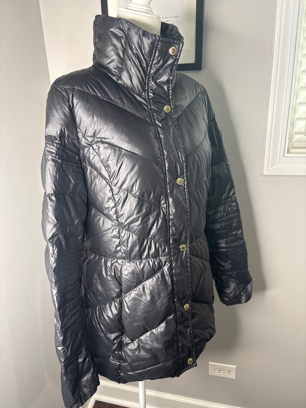 Black Quilted Puffer Jacket with High Collar and Snap Buttons
