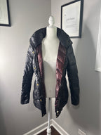 Black Quilted Puffer Jacket with High Collar and Snap Buttons