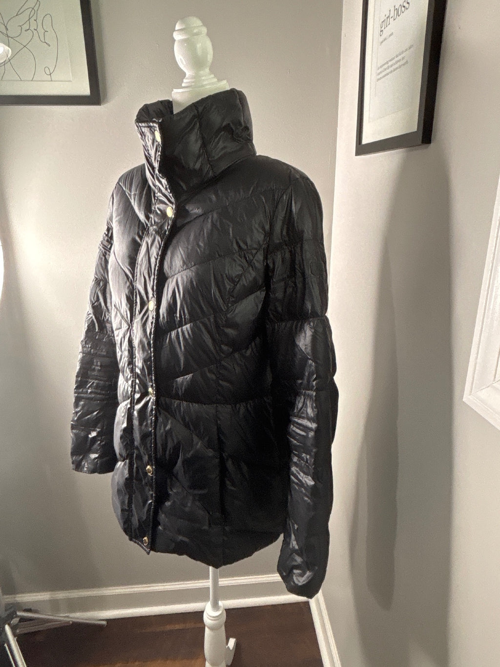 Black Quilted Puffer Jacket with High Collar and Snap Buttons