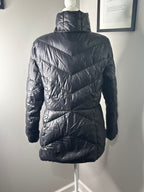 Black Quilted Puffer Jacket with High Collar and Snap Buttons